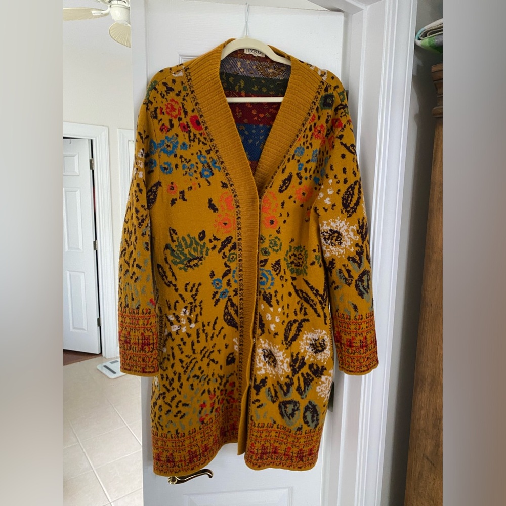 NWOT IVKO sold by Sundance 
Cute with leggings/boots